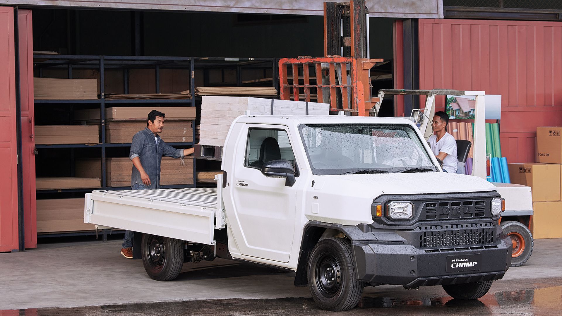 Toyota Hilux Champ at a factory being loaded with a pallet